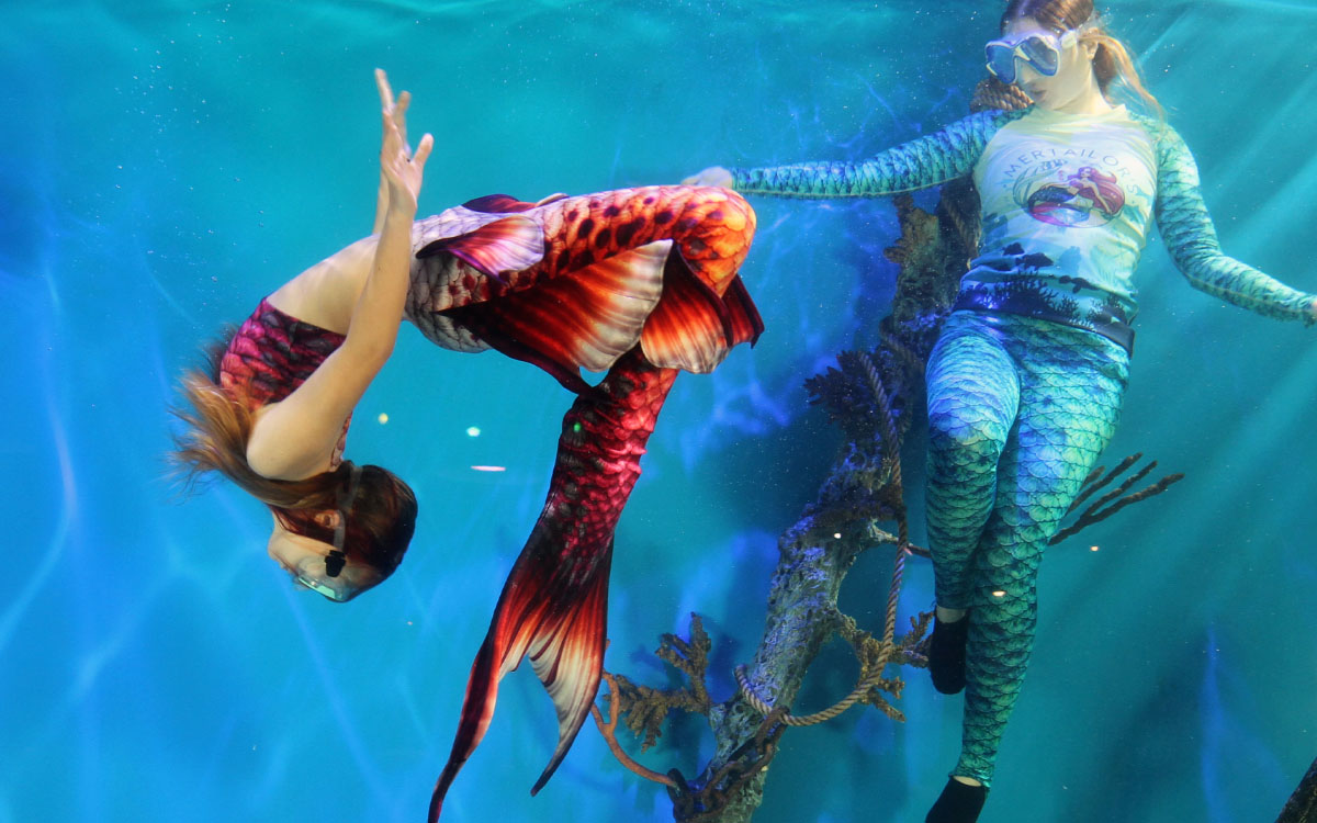 Mermaid performer preparation behind the scenes at Mertailor