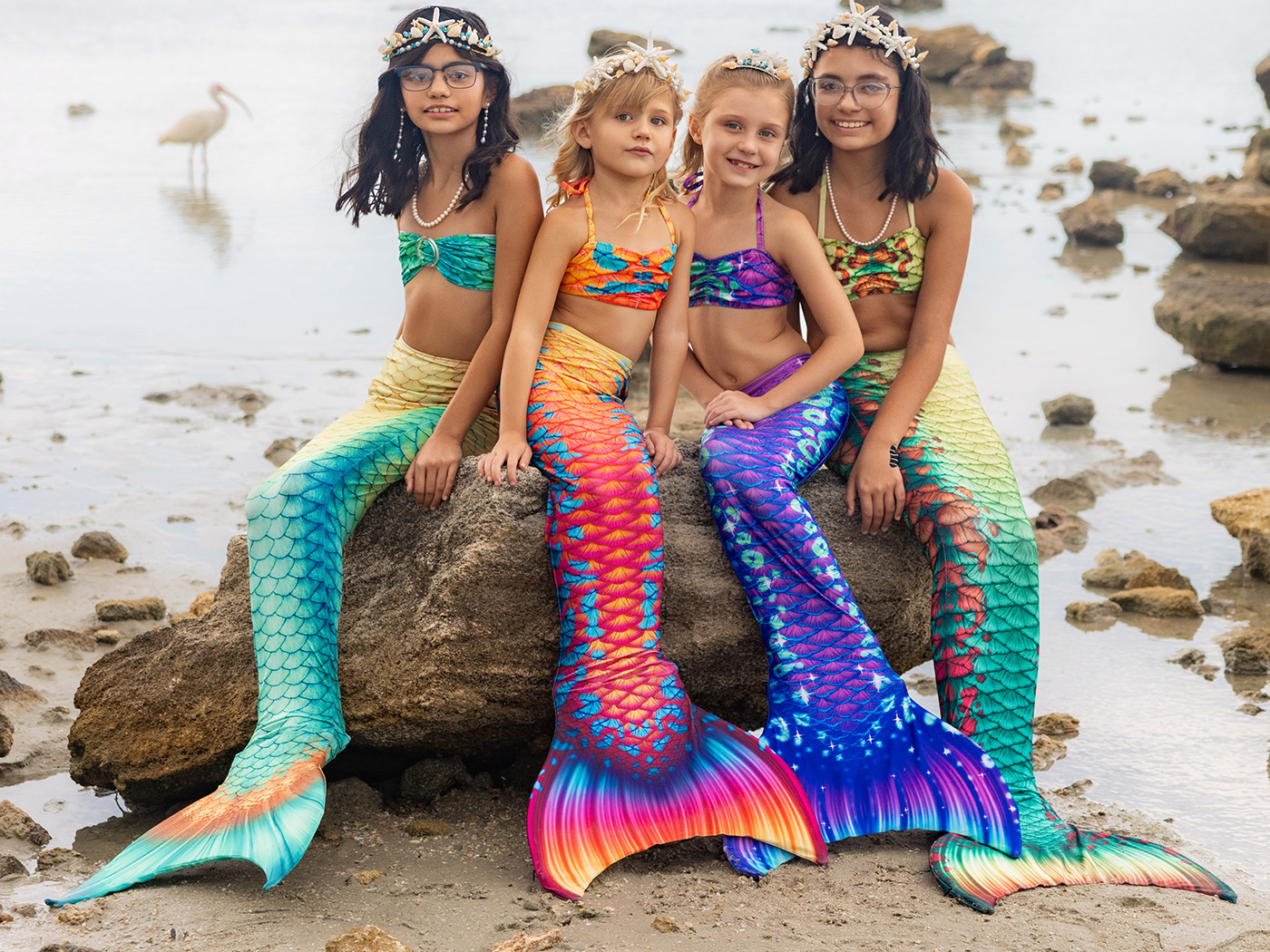 Mermaid swimming in a Mertailor Guppy Mermaid Tail