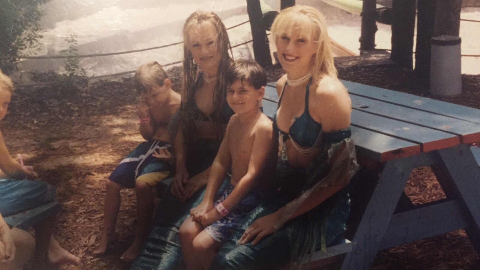 Eric Ducharme at age six with Weeki Wachee mermaids
