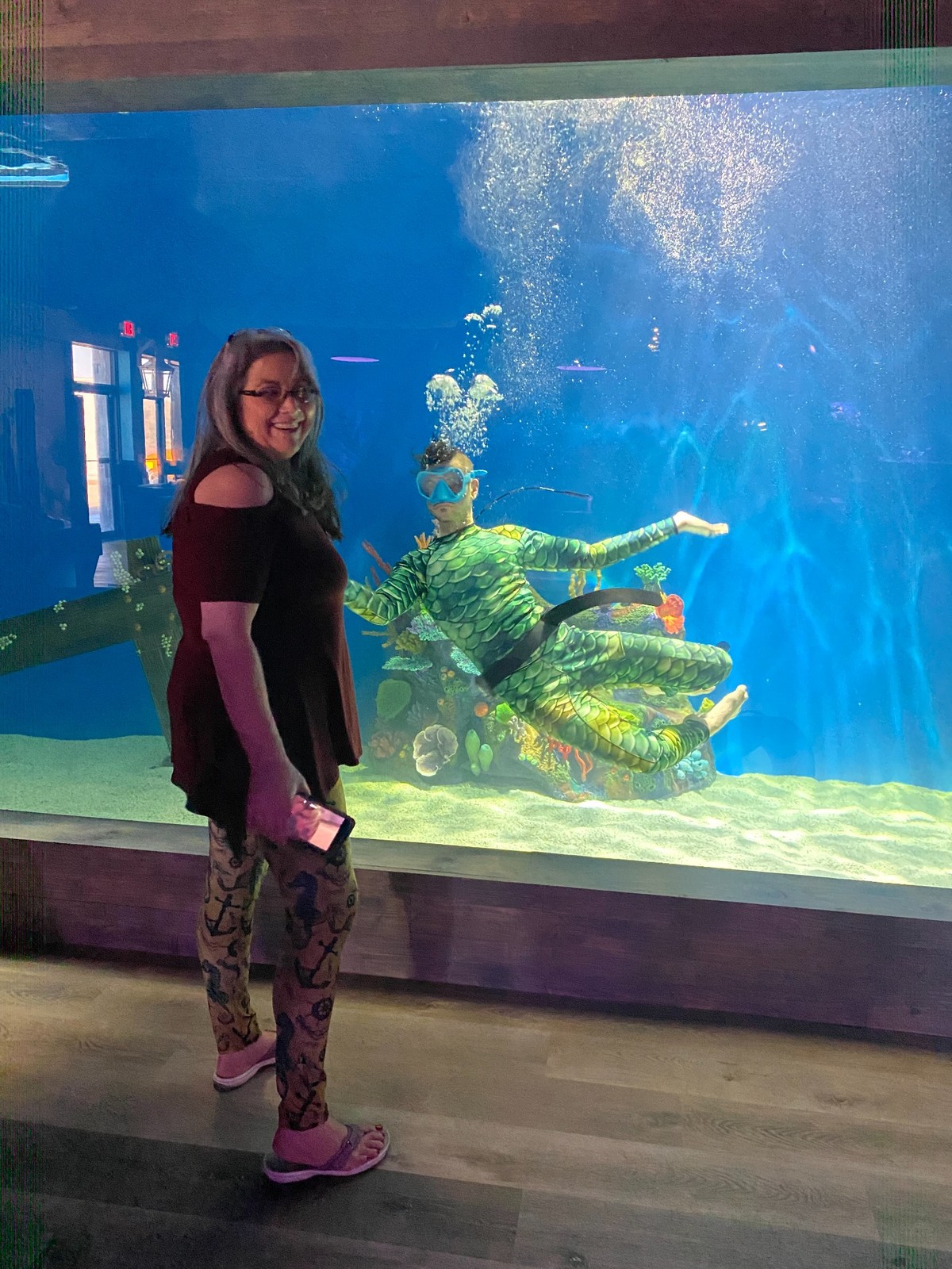Eric Ducharme and his mother Candy at the completed mermaid aquarium